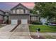 Charming two-story home featuring a two-car garage, mature landscaping, and a well-maintained lawn at 11005 Louson Pl, Raleigh, NC 27614