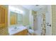This well-lit bathroom features a shower/tub combo and classic vanity at 1116 Little Creek Rd, Durham, NC 27713