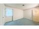 A well-lit bedroom offers a window and is ready for personalization at 1116 Little Creek Rd, Durham, NC 27713