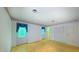 This bedroom has floral wallpaper, two windows, and is move-in ready at 1116 Little Creek Rd, Durham, NC 27713