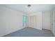 A bright bedroom features natural light and closet space at 1116 Little Creek Rd, Durham, NC 27713