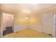Eat-in kitchen featuring vintage tile flooring, white appliances, and classic decor at 1116 Little Creek Rd, Durham, NC 27713