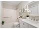 Bathroom with a tub, white marble vanity and modern finishes at 118 Rhum Pl, Garner, NC 27529