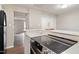 Modern kitchen with stainless steel appliances, ample countertop space and a view into another room at 118 Rhum Pl, Garner, NC 27529