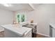 Bright kitchen featuring stainless steel appliances, granite countertops, and backyard access at 118 Rhum Pl, Garner, NC 27529