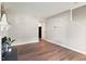 The large living room features hardwood floors and leads to the kitchen at 118 Rhum Pl, Garner, NC 27529