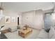 Inviting living room showcasing neutral paint, new floors, and lots of natural light at 118 Rhum Pl, Garner, NC 27529