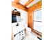 Bathroom with a white vanity, modern mirror, black hardware, and a wood-trimmed window for a stylish design at 1283 Ennis Rd, Angier, NC 27501