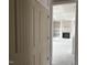 Spacious living area highlighting a fireplace with built in shelves, and a doorway at 129 Retreat Run, Smithfield, NC 27577