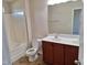 Bathroom featuring double sink vanity and a shower-tub combo at 1304 Cozart St # 119, Durham, NC 27704