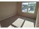Bright bedroom with neutral carpet and a window that allows plenty of natural light at 1304 Cozart St # 119, Durham, NC 27704