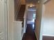 Bright foyer with staircase and neutral walls, leading to the main living area at 1304 Cozart St # 119, Durham, NC 27704