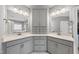 This bathroom features a double vanity, white countertops, and stylish gray cabinetry at 1324 Sandybrook Ln, Wake Forest, NC 27587