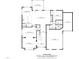 First floor layout featuring living spaces including living room, kitchen, dining, and bedrooms at 1324 Sandybrook Ln, Wake Forest, NC 27587
