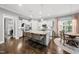Spacious kitchen featuring a large island with seating and stainless steel appliances at 1324 Sandybrook Ln, Wake Forest, NC 27587