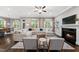 Bright living room with a fireplace, comfortable seating, and open floor plan at 1324 Sandybrook Ln, Wake Forest, NC 27587