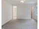 Spacious bedroom with neutral carpeting and an ensuite bathroom at 137 Wintermist Dr, Cary, NC 27513