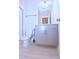 Bathroom with a gray vanity, toilet, and walk-in shower at 1441 Rosepine Dr Dr, Cary, NC 27519