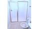Well-lit bathroom features walk-in shower and a toilet at 1441 Rosepine Dr Dr, Cary, NC 27519