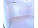 Empty carpeted bedroom with neutral walls and recessed lighting, perfect for personalization at 1441 Rosepine Dr Dr, Cary, NC 27519