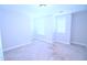 Bedroom with a window with blinds and neutral carpeting at 1441 Rosepine Dr Dr, Cary, NC 27519