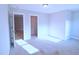 Bedroom view with open doors to a closet and hallway at 1441 Rosepine Dr Dr, Cary, NC 27519