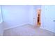 View of a carpeted bedroom with two closets and a window at 1441 Rosepine Dr Dr, Cary, NC 27519