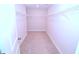 Walk-in closet with white wire shelving provides ample storage space for organization at 1441 Rosepine Dr Dr, Cary, NC 27519