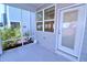 View of the screened porch with backyard views and access to the house at 1441 Rosepine Dr Dr, Cary, NC 27519
