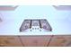 Close up of a four burner gas stovetop at 1441 Rosepine Dr Dr, Cary, NC 27519