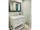 Bathroom featuring a vanity with a white countertop and a mirror at 1512 Cumberland Rd, Chapel Hill, NC 27514