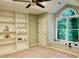 Bright bedroom features vaulted ceilings, large windows, and built-in shelving at 1512 Cumberland Rd, Chapel Hill, NC 27514