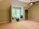 Inviting bedroom featuring a window nook and soft, neutral carpeting throughout at 1512 Cumberland Rd, Chapel Hill, NC 27514