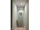 Hallway with decorative window for natural light at 1512 Cumberland Rd, Chapel Hill, NC 27514