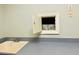 Bright laundry area with a sink, spacious countertop, and a convenient storage compartment at 1512 Cumberland Rd, Chapel Hill, NC 27514