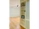 Living room displaying an open floor plan, built-in shelving, and hardwood flooring at 1512 Cumberland Rd, Chapel Hill, NC 27514