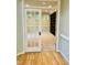 View of the office space with built in bookshelf and white trim door at 1512 Cumberland Rd, Chapel Hill, NC 27514