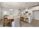 Beautiful kitchen featuring an island, stainless appliances, and a nearby dining area at 1525 Tamarisk Ln, Durham, NC 27703