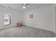 Bedroom features one window, light colored carpet and neutral colored walls at 1536 Maybrook Dr, Raleigh, NC 27610