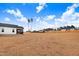Expansive backyard with newly seeded lawn and view of screened porch at 162 Gumtop Dr, Zebulon, NC 27597