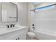 Bathroom featuring white tile, black hardware, and neutral paint at 162 Gumtop Dr, Zebulon, NC 27597