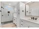 Bright bathroom with a glass-enclosed shower and modern vanity with sleek black fixtures at 162 Gumtop Dr, Zebulon, NC 27597