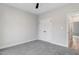 Bedroom featuring neutral carpet, a closet and views into other rooms at 162 Gumtop Dr, Zebulon, NC 27597