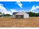 Exterior shot of new construction home showing spacious back yard at 162 Gumtop Dr, Zebulon, NC 27597