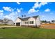 Exterior view of a single-story home, showcasing its well-kept lawn and neighborhood setting at 162 Gumtop Dr, Zebulon, NC 27597