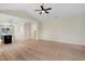 Open-concept living room with hardwood floors connected to the kitchen at 162 Gumtop Dr, Zebulon, NC 27597