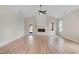 Spacious living room with hardwood floors, a fireplace, and plenty of natural light at 162 Gumtop Dr, Zebulon, NC 27597