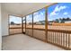 Spacious screened-in porch with wood frame and view of backyard at 162 Gumtop Dr, Zebulon, NC 27597
