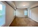 Spacious bedroom with soft carpet, bright windows, and ample room for furniture arrangement at 1746 Hammocks Beach Trl, Apex, NC 27502