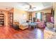 Eclectic bedroom with hardwood floors, sitting area, lots of furniture, and lots of decorative items at 1770 Gentry Ridge Rd, Roxboro, NC 27574